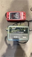 Two electric fence chargers