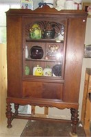 Antique cabinet with glass door and 3 shelves.