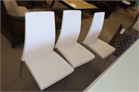 Set of 8 pebble white leather chairs