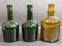 Three Decorative Glass Bottles