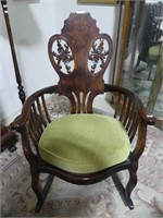 ANTIQUE MAHOGANY ARMED ROCKING CHAIR