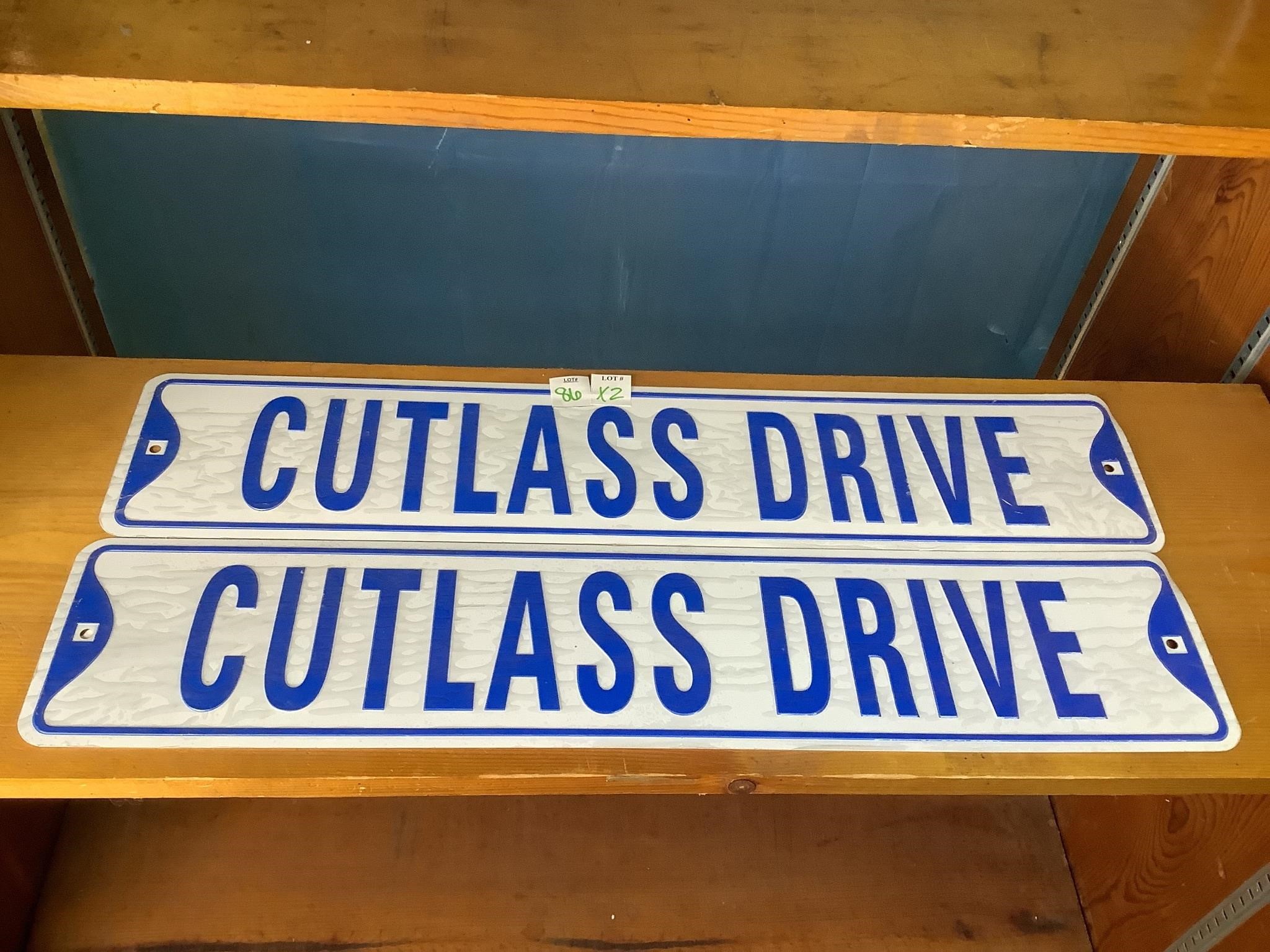 Cutlass Drive Tin Signs