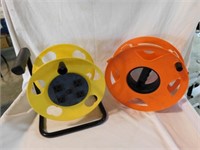 2 plastic electrical cord winders, one w/ 4