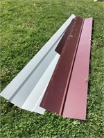 Three burgundy sheets of metal Approximately 10