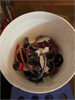 Bucket of bungee cords & oil can