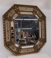 Ornate Italian-style octagonal wall mirror