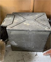 Large antique metal storage box filled with extra