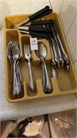 Tray of flatware and steak knives