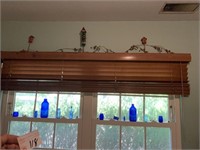 Blue Bottles in Window and Decor on Top