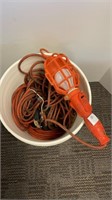 Extension cords and work light in 5gal bucket