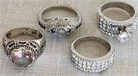 D - LOT OF 4 STERLING SILVER RINGS (G205)