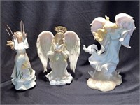 Angel figurines, one is a Seraphim Classics