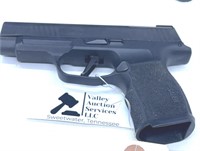 Sig Sauer 9mm with 2 clips