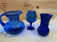 3 pieces of blue glass