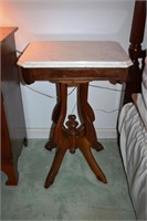 Carved walnut marble top pedestal stand
