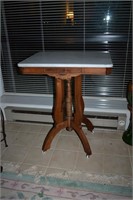 Carved walnut marble top pedestal stand