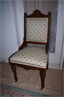 Carved walnut and upholstered side chair