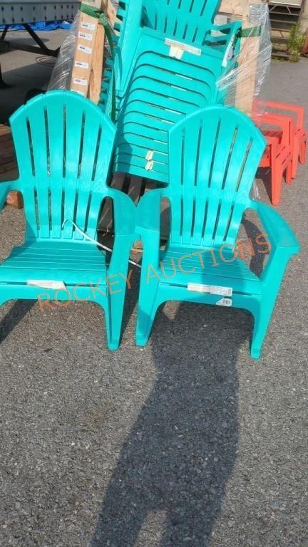 Pair of teal plastic Adirondack chairs