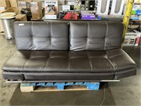 BROWN LEATHER FUTON/COUCH, PLUGS INTO WALL **MAY