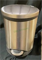 Small stainless foot activated waste can