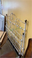 Beautiful full size iron bed with brass finials