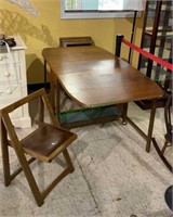 Beautiful space saving dining table with four
