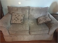 On trend Love seat by Ashley