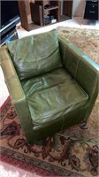 Mid  century modern green swival chair