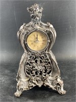 Mantel clock resembling 19th century Austrian desi