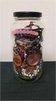 7 inch tall jar of jewelry