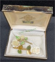 Beautiful vintage rose brooches. One possibly