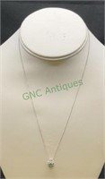 14k white gold necklace with pendant.