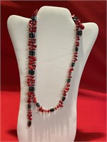 Strand of hematite and coral.  Measures 33