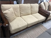 Tan Upholstered with Wood Base Sofa