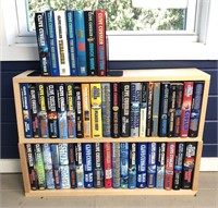 Collection of Clive Cussler Novels & Bookcase