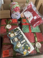 Napkins, Christmas buckets, socks, metal tins.,