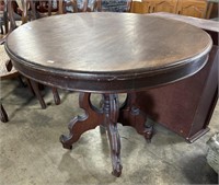 Victorian Style Round Walnut Table.