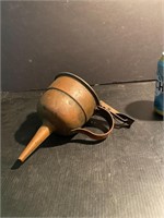 Antique copper oil can