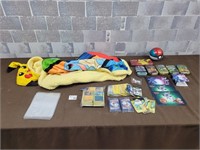 Poke Mon cards, blanket, tin boxes