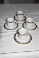 Set of 4 demitasse cups and saucers.