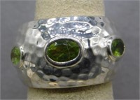 Sterling Silver ring with peridot stone, size 6.