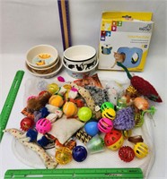 Cat toys and food bowls