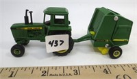JD tractor with round baler