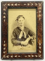 Portrait of Woman in Wooden Frame