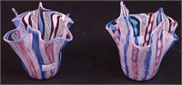A pair of ribbon glass handkerchief vases,