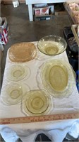 Yellow glass dishes, wine glasses