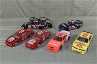 6 NASCAR die cast models, 1 as a phone; as is