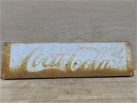 Rusted Coca Cola tin sign