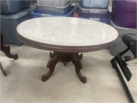 Marble top table (approx 19” h x 34” l )