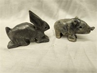 Rabbit and Pig stone sculptures